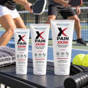 XKINI Muscle & Joint Pain Cream in 3 oz, 4 oz and 6 oz sizes beside an outdoor pickleball game